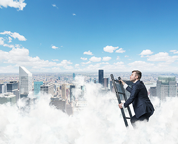 stock photo 62172356 businessman is climbing ladder to success